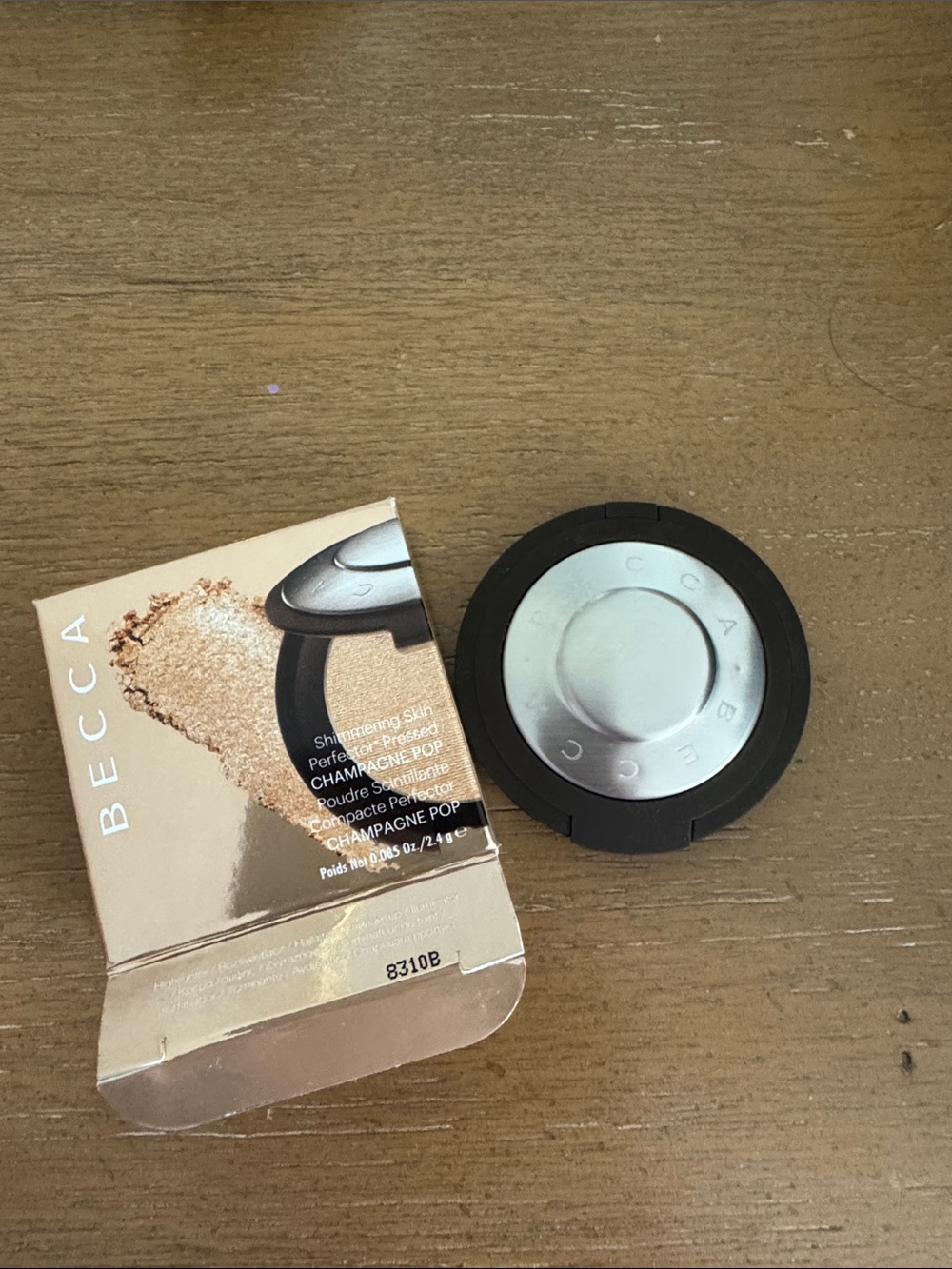 BECCA Champagne Pop Pressed Highlighter — Gold Tone